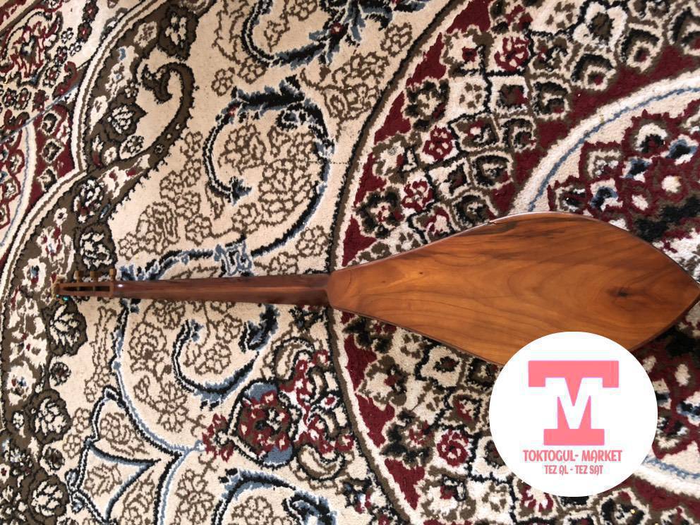 Комуз сатыллат капкагын алмаштырып бир кылы узук  озу орук комуз