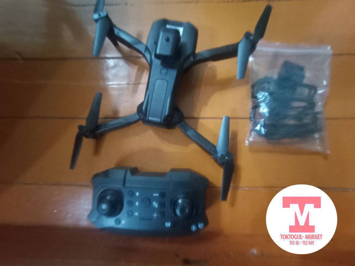 дрон сатылат бир кун колдонулган бүттүгү масло комплектинде кошулган канаттар бар камерасы бар 2к тартат заряды минимум 1саатга жетет 
заряд толгону жарым саат 
минустары : кебир жектери кичине тытык поцарапоный  
комлекте :4 зашитасы  бар , телефон койгучу бар пульттун устуно салып телефонго приложениясын откозот ал жактан видеого да тартсан болот суротко дагы 1200 го алгам 1000 ге сатам