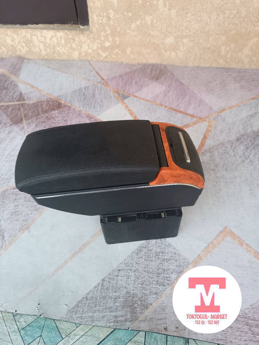 карман 2107 размер тура келбей калды 400 сом
подлокотник сатылат артында USB 4 шт сайгычы подстаканникиги  бар таза бойдон 2000